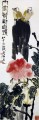 Pájaros Qi Baishi sobre tinta china antigua de flores